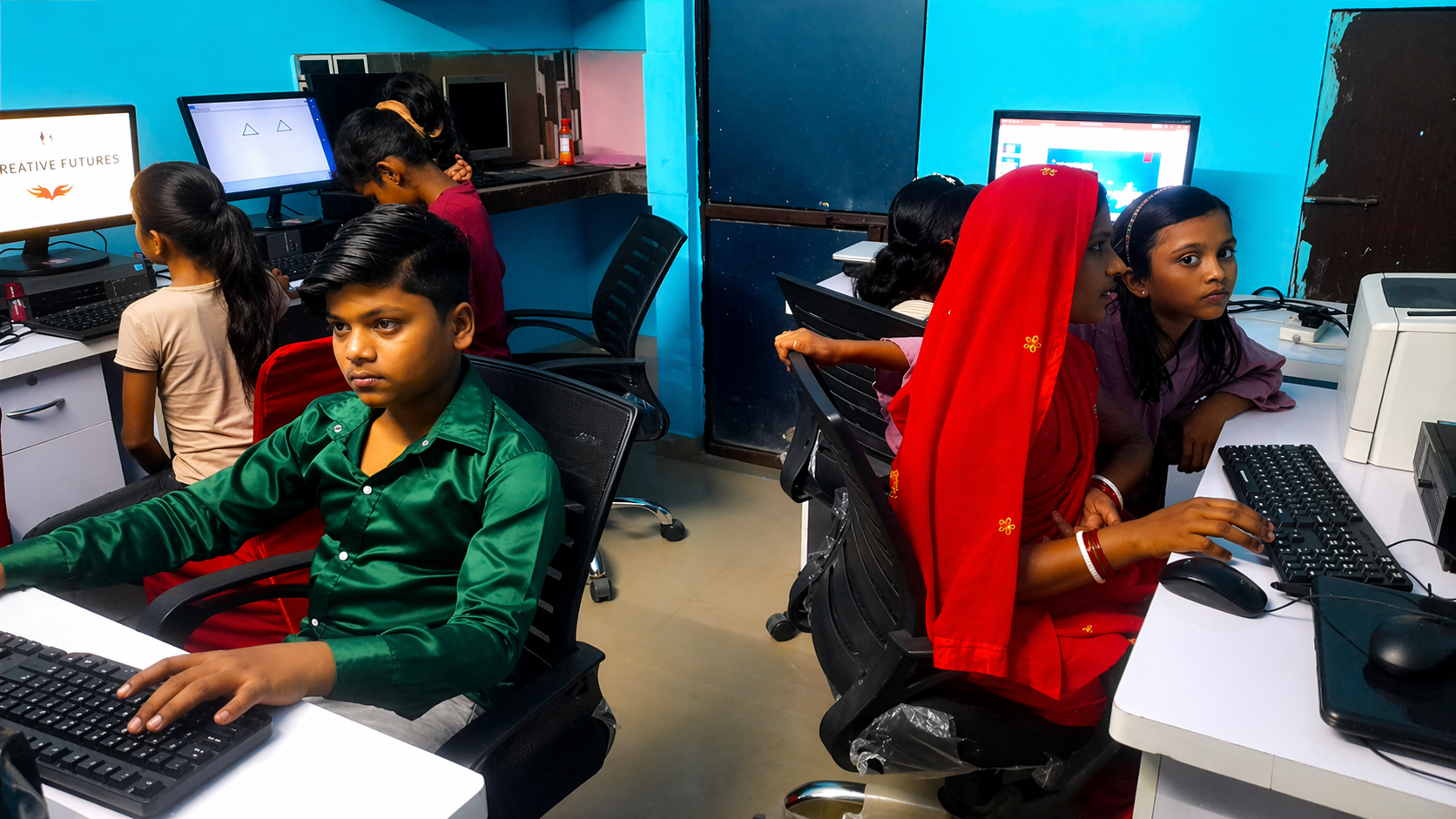 Students learning computer skills at Project Educate Centre Gurugram